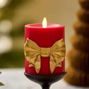 Luminara Flameless Battery Operated Red Pillar Candle - 3.4"x4.5", Gold Bow Tie