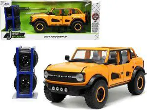 2021 Ford Bronco Orange Metallic with Extra Wheels "Just Trucks" Series 1/24 Diecast Model Car by Jada