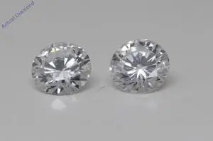 A Pair of Round Cut Loose Diamonds (0.69 Ct,E Color,VS1- VS2 Clarity) GIA Certified