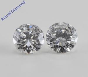 A Pair of Round Cut Loose Diamonds (2.06 Ct, F-G ,I1-SI3)