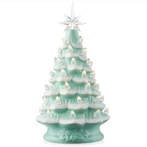 Casafield Hand Painted Ceramic Christmas Tree, Seafoam Snow Flocked 12-Inch Pre-Lit Tree with 100 Multi Color Lights and 2 Star Toppers Casafield Hand Painted Ceramic Christmas Tree, Seafoam Snow Flocked 12-Inch Pre-Lit Tree with 100 Multi Color Lights and 2 Star Toppers