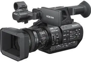 Panasonic AG-UX180 4K Professional Camcorder (AG-UX180PJ8) With Tripod, Sony Headphones, Padded Case, LED Light, 64GB Card, Tripod, External 4K Monitor, Rode NTG1 Mic and Much More Film Maker Bundle