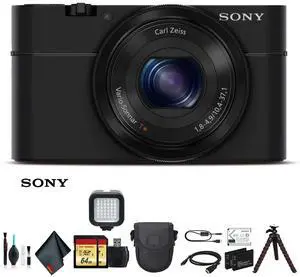 Sony Cyber-shot DSC-RX100 Camera DSCRX100/B With Soft Bag, Tripod, 2x Extra Batteries, LED Light, 2x 64GB Memory Card, Card Reader , Plus Essential Accessories