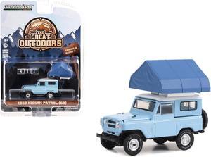 1969 Nissan Patrol (60) Light Blue with White Top and Camp'otel Cartop Sleeper Tent 1/64 Diecast Model Car by Greenlight