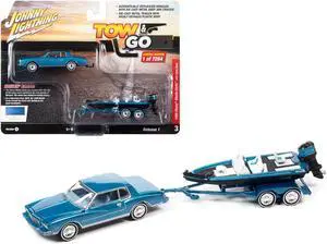 1980 Chevrolet Monte Carlo Bright Blue Met. w/Blue Interior w/Bass Boat & Trailer 1/64 Diecast Model Car by Johnny Lightning