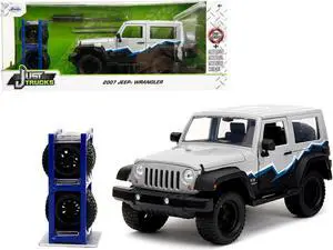 2007 Jeep Wrangler Gray and Black with Blue and White Stripes w/Extra Wheels "Just Trucks" Series 1/24 Diecast Model Car by Jada