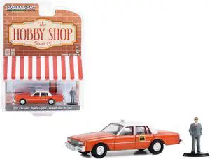 1981 Chevrolet Impala "Capitol Cab" Taxi Orange with White Top and Man in Suit Figure 1/64 Diecast Model Car by Greenlight