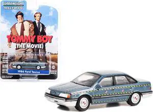 1986 Ford Taurus Blue Met. "Zalinsky Auto Parts" Crash Test Vehicle "Tommy Boy" 1995 Movie 1/64 Diecast Model Car by Greenlight