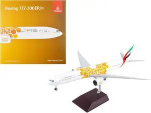 Boeing 777-300ER Commercial Aircraft White with Orange Graphics "Gemini 200" Series 1/200 Diecast Model Airplane by GeminiJets