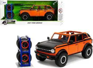 2021 Ford Bronco Open-Top Orange with Black Stripes & Hood w/Extra Wheels "Just Trucks" Series 1/24 Diecast Model Car by Jada.