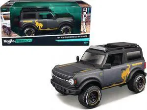 2021 Ford Bronco Badlands Dark Gray Metallic with Gold Graphics and Roof Rack "Off-Road" 1/24 Diecast Model Car by Maisto