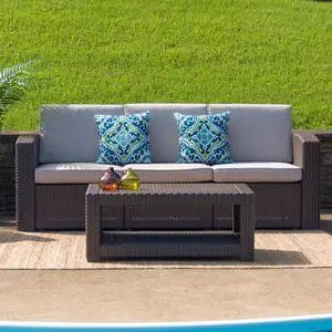 Chocolate Brown Faux Rattan Sofa with All-Weather Beige Cushions Chocolate Brown Faux Rattan Sofa with All-Weather Beige Cushions