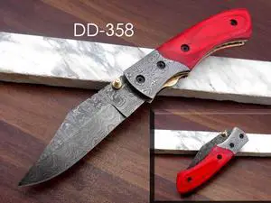 8.3" long hand forged custom made Damascus steel pocket clip folding knife, Red colored Camel bone scale, cow leather sheath Red