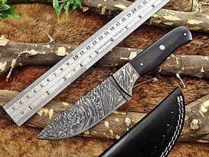 9.25" Long hand forged Damascus steel full tang drop point blade skinning Knife, Buffalo Horn scale with Damascus Bolster Cow Leather sheath