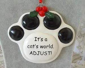 Ceramic Paw Print Christmas Ornament "It's a Cat's World. Adjust!" Ceramic Paw Print Christmas Ornament "It's a Cat's World. Adjust!"
