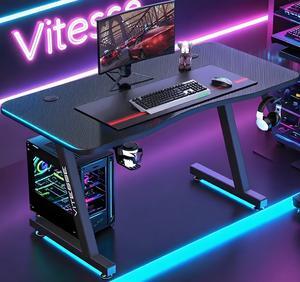 Vitesse 55 inch Gaming Desk, Ergonomic Office PC Computer Desk with Full Desk Mouse Pad, T-Shaped Gamer Tables Pro with Gaming Handle Rack, Stand Cup Holder&Headphone Hook