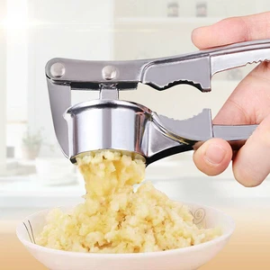 4-in-1 Garlic Ginger Walnut Press Crusher Mincer Chop Squeeze Bottle Opener 4-in-1 Garlic Ginger Walnut Press Crusher Mincer Chop Squeeze Bottle Opener