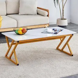 A coffee table made of rock slab material, with a smooth and natural surface that complements the modern design of the golden metal legs, making it suitable for living rooms .47*23.6 W1151P154282