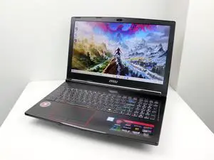 MSI GX63VR-NE1070 15.6" Full HD NVIDIA GeForce GTX 1070 8GB Intel Core i7-7700HQ 32GB Memory 1TB SSD Windows 11 Home VR Ready Gaming Laptop