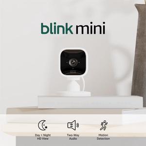 Blink Mini - Compact indoor plug-in smart security camera, 1080p HD video, night vision, motion detection, two-way audio, easy set up, Works with Alexa  3 cameras (White)