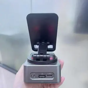 2025 New Three-in-one mobile phone holder Bluetooth speaker charging treasure call speaker multi-function colored light foldable desktop