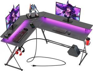 Gaming Desk 58 with LED Strip  Power Outlets LShaped Computer Corner Desk Carbon Fiber Surface with Monitor Stand Ergonomic Gamer Table with Cup Holder Headphone Hook Black