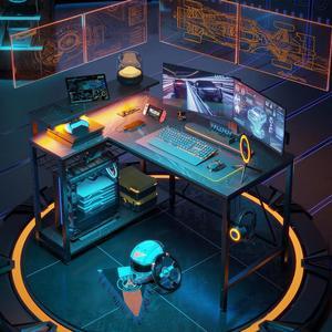 Bestier Gaming Desk with Power Outlets, 42" L-Shaped Gaming Desk with LED Lights, Desk with Reversible Storage Shelves & Hooks for Small Spaces, Bedrooms & Offices,Black Marble