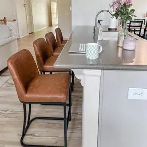 MAISON ARTS Counter Height Bar Stools with Back Set of 4 for Kitchen Counter, 24 Inch Modern Upholstered Faux Leather Barstools Farmhouse Bar Chairs Luxury Island Stools Support 330LBS, Brown