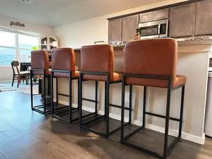 ALPHA HOME 24 Bar Stools Set of 4 Counter Height Bar Stool Pu Leather Kitchen Modern Bar Stools with Backrest Upholstered Footrest Sturdy Chromed Metal Steel Frame,Brown.