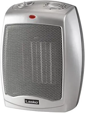 Lasko Desktop Electric Ceramic Space Heater with Adjustable Thermostat, 2 Heat Settings and Fan Only Mode, 9.2 Inches, Silver, 754200