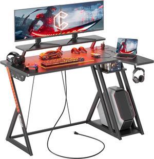 CubiCubi Gaming Desk with LED Lights & Power Outlets, 40 Inch L Shaped Carbon Fiber Surface Desk with Storage Shelves, Small Corner Computer Desk with Monitor Shelf, Black