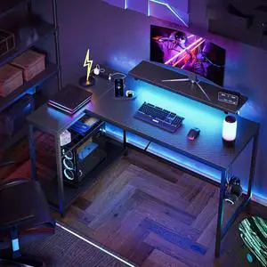 Bestier 48" L-Shaped Gaming Desk with LED Lights, Power Outlets, and Monitor Stand Carbon Fiber Black