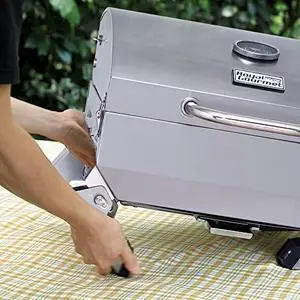 Gourmet GT1001 Stainless Steel Portable Grill, 10000 BTU BBQ Tabletop Gas Grill with Folding Legs and Lockable Lid, Outdoor Camping, Deck and Tailgating, Silver