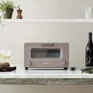 The Toaster | Steam Oven Toaster | 5 Cooking Modes: Sandwich Bread, Artisan Bread, Pizza & Pastry, Oven | Precise Heat Control | Steam Technology | Baking Pan | US Version | Black