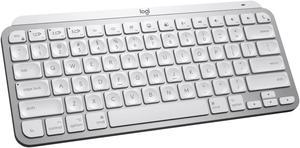 Logitech MX Backlit Keys Mini for Mac Minimalist Wireless Illuminated Keyboard Compact Bluetooth USBC for MacBook Pro Macbook Air iMac iPad  With Free Adobe Creative Cloud Subscription