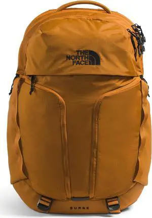 THE NORTH FACE Surge Commuter Laptop Backpack | Daypack with Water Repellent Finish, 16" Laptop Sleeve, Reflective Details, Timber Tan, One Size