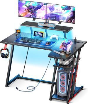 MOTPK Small Gaming Desk with LED Lights & Power Outlets, 39 Inch L Shaped Gaming Computer Desk with Storage Shelf, Gamer Table with Monitor Stand, PC Table with Carbon Fiber Texture, Black