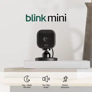 Mini - Compact indoor plug-in smart security camera 1080p HD video night vision motion detection two-way audio easy set up Works with Alexa C 1 camera (Black)