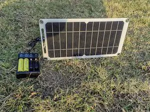 HUYINGC Solar power Charger with 6 Watt Portable Solar Panel for 1.2V AA & AAA Ni-MH Ni-CD Household Rechargeable Batteries and with 5V USB Output for cellphone or other Batteries needed charging-Blac