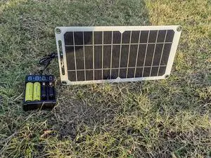 HUYINGC Solar power Charger with 6 Watt Portable Solar Panel for 1.2V AA & AAA Ni-MH Ni-CD Household Rechargeable Batteries and with 5V USB Output for cellphone or other Batteries needed charging-Blac