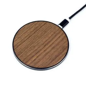 Solid wood surface wireless charger with 15W fast chargingNew walnut wood wireless charger. Suitable for iPhone 16. Solid wood surface wireless charger with 15W fast chargingNew walnut wood wireless charger. Suitable for iPhone 16.
