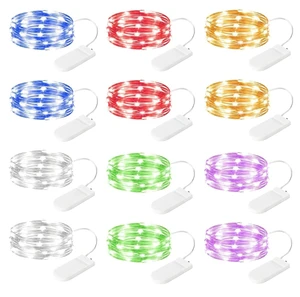 Brightown 12 Pack Multi Color Fairy Lights Battery Operated for Xmas Decor | 20 LED Bulbs, 7ft Flexible Silver Wire, Waterproof, Lovely for DIY Crafts Wedding Table Centerpieces Chirstmas Decoration Brightown 12 Pack Multi Color Fairy Lights Battery Operated for Xmas Decor | 20 LED Bulbs, 7ft Flexible Silver Wire, Waterproof, Lovely for DIY Crafts Wedding Table Centerpieces Chirstmas Decoration