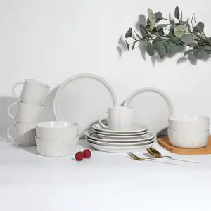 TABLE 12 Dinnerware Set, Parchment Embossed Dish Set for 4 with Dinner Plates, Dessert and Salad Plate Set, Bowl Set, and Mugs, Simple Modern Kitchenware, White, 16-Piece TABLE 12 Dinnerware Set, Parchment Embossed Dish Set for 4 with Dinner Plates, Dessert and Salad Plate Set, Bowl Set, and Mugs, Simple Modern Kitchenware, White, 16-Piece