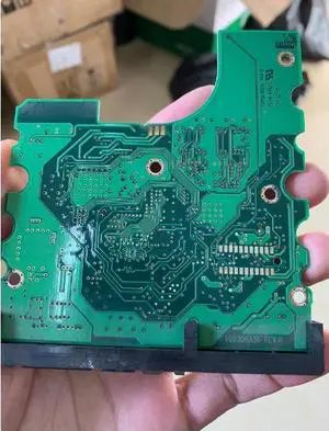 Circuit board hard disk board number 100306336 REV A white el 10027634 Circuit board hard disk board number 100306336 REV A white el 10027634