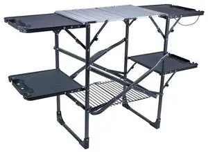 GCI OUTDOOR Slim-Fold Cook Station | Portable Folding Kitchen Table with a Heat Resistant Tabletop, 4 Side Tables & Storage Rack, Perfect for Picnics & Camping Trips GCI OUTDOOR Slim-Fold Cook Station | Portable Folding Kitchen Table with a Heat Resistant Tabletop, 4 Side Tables & Storage Rack, Perfect for Picnics & Camping Trips