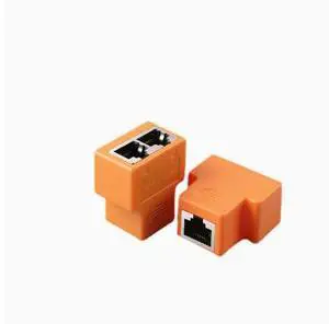 Network patch panel for splitting one line into two for internet, IPTV, broadband and computer connection. Three-way high-speed transfer connector. Network patch panel for splitting one line into two for internet, IPTV, broadband and computer connection. Three-way high-speed transfer connector.