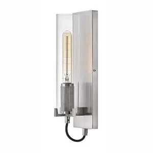 Ryden Medium Indoor Single Light Wall Sconce, Brushed Nickel Finish | Clear Glass Cylinder Shade, Modern Industrial, Sleek, Includes Med. LED Bulb, Shown w/ T-Style Bulb, Hidden Mounting Hardware Ryden Medium Indoor Single Light Wall Sconce, Brushed Nickel Finish | Clear Glass Cylinder Shade, Modern Industrial, Sleek, Includes Med. LED Bulb, Shown w/ T-Style Bulb, Hidden Mounting Hardware