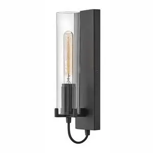 Ryden Medium Indoor Single Light Wall Sconce, Black Finish | Clear Glass Cylinder Shade, Modern Industrial, Sleek, Includes Med. LED Bulb, Shown w/ T-Style Bulb, Hidden Mounting Hardware Ryden Medium Indoor Single Light Wall Sconce, Black Finish | Clear Glass Cylinder Shade, Modern Industrial, Sleek, Includes Med. LED Bulb, Shown w/ T-Style Bulb, Hidden Mounting Hardware