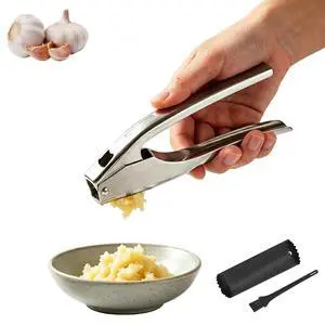 Garlic Press Stainless Steel, with Peeler Tube and Cleaning Brush Garlic Press Stainless Steel, with Peeler Tube and Cleaning Brush