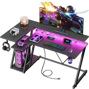 47 Inch Gaming Desk with Power Outlet & LED Lights, Corner Computer Desk with 3 Tiers Storage Shelves, Home Office Desk with Monitor Stand for Small Space, Carbon Fiber Black 47 Inch Gaming Desk with Power Outlet & LED Lights, Corner Computer Desk with 3 Tiers Storage Shelves, Home Office Desk with Monitor Stand for Small Space, Carbon Fiber Black